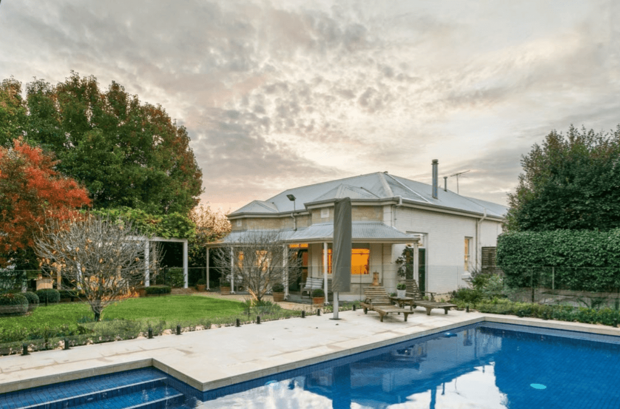 A poolside bungalow with a certificate of construction